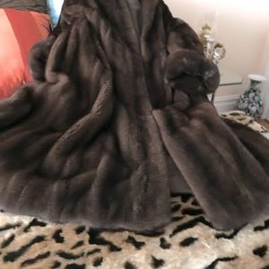 Custom made mahogany mink,fits size 6 to 8 with a flare.Slightly worn like new